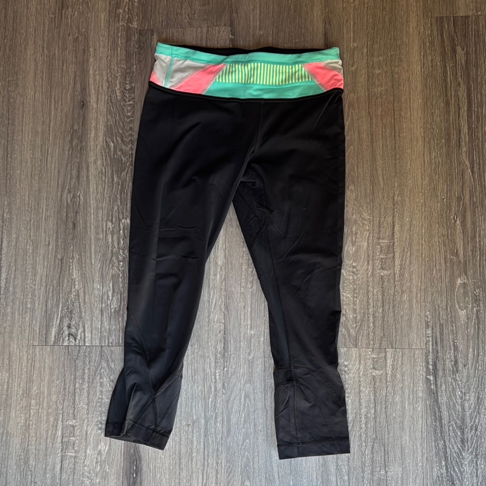 Lululemon Athletica Black Capris with Pink and Green Accents